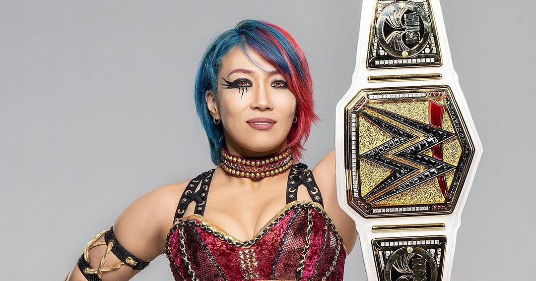 Asuka with her WWE Women's Title